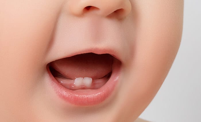 دندان در آوردن چه علائمی دارد؟